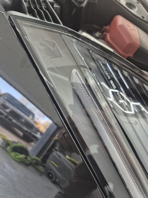 Jag Cracked Light 1.jpeg Jag Cracked Light 1.jpeg